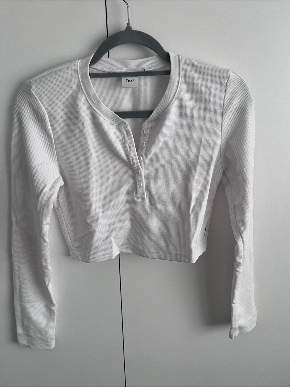 AritziaTNA White Long-Sleeve Waffle Henley Crop Top